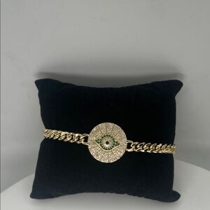 045. 18k Gold Plated Evil Eye Bracelet with green accents 7 1/4”